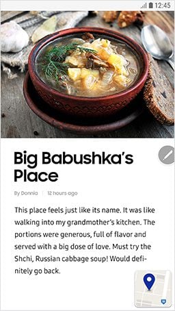 Image of an online restaurant review with photo with the map app minimized and at the bottom right corner